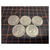 5 Kennedy half dollars
