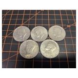 5 Kennedy half dollars