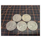 5 Kennedy half dollars