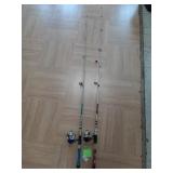 2- fishing rod & reels. Case 25-4014