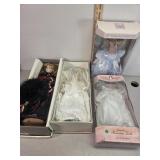 Porcelain dolls in boxes