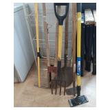 > Yard tools: hoe, fork, hole spade +