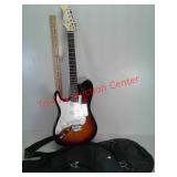 Left-handed electric guitar in case