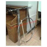 > Metal round clothes rack