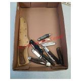 Various pocket knives and knife with leather