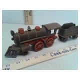 Cast iron train and car toy