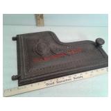 Cast iron wood stove door