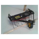 John Deere dethatcher mower attachment