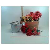 Metal watering can and assorted silknflowers