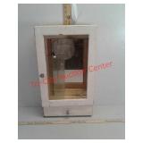 Vintage medicine cabinet with glass shelves and