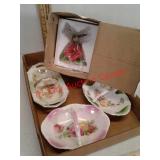 Small painted dishes and hummingbird figurine