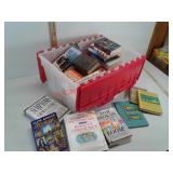 Storage tote with various books