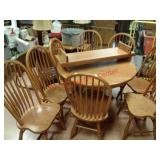 Oakwood Ind 44" dining table, 8 chairs, two 12"