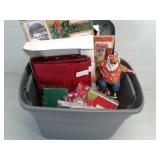 Totes of Christmas decor ornaments and stationery