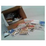 Box of craft items - hot glue guns, stamps + + +