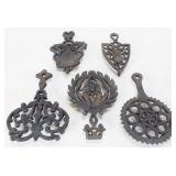 Five Cast Iron Trivets