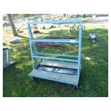 BLUE METAL DISPLAY CART ON WHEELS