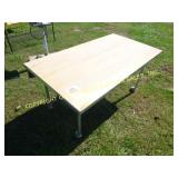 WOODEN TABLE ON WHEELS