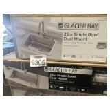 2 sinks with faucets and accessories