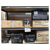 Mix items batteries and more contents on the shelf