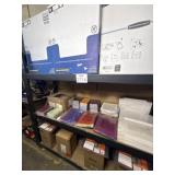 Assorted office supplies contents on the shelf