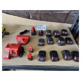 Assorted Milwaukee Batteries and Chargers