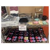 Assorted Items Pictured on Shelf