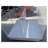 (1) large, clear acrylic display cabinet with a
