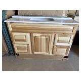 48 inch. Vanity with quartz top ( still in the