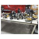 Table full of electrical hand tools