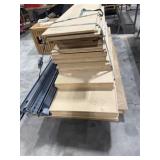 Pallet containing wood shelfï¿½s and shelving metals