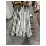Pallet of metal and aluminum bars, various lengths
