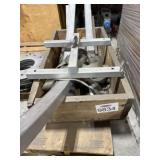 Pallet with box of metal bars, strapping and