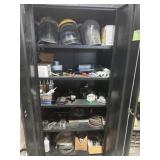 Two door upright storage cabinet with contents