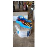 Roll of Manville Insulation and a Playground Swing