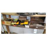 Large Group of Drill Bits on Shelf