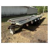 Homemade Tandem-Axle Trailer with Salvage Metal