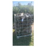 Steel Cage of Seasoned Firewood