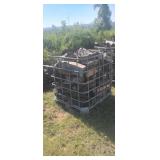 Steel Cage of Seasoned Firewood