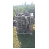 Steel Cage of Seasoned Firewood