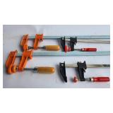 Four Metal and Wood Bar Clamps
