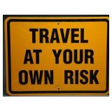 Metal Road Sign 'Travel At Your Own Risk'