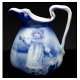 Flow Blue Babes and Dog Bulbous Pitcher