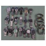 1 BAG WITH SILVER TONE WATCHES