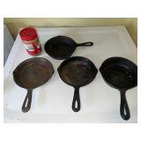 4 small 7 inch cast iron pans