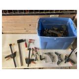 Tub full of many different types of clamps