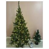 2 Christmas trees and snowman decor