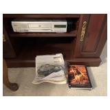 Sanyo DVD player w manual, cords, and movies