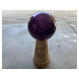 Purple gazing ball on stand