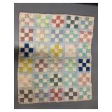 Hand stitched baby quilt